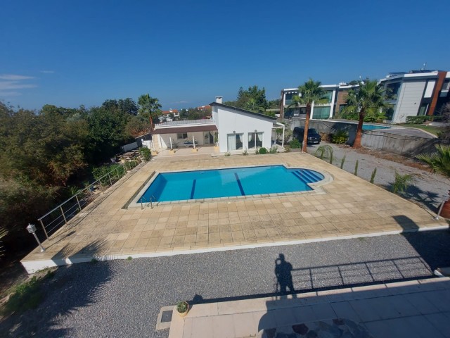 3+1 detached house for rent with two villas in a central location in Alsancak, with a shared pool, garden, fireplace, three bathrooms