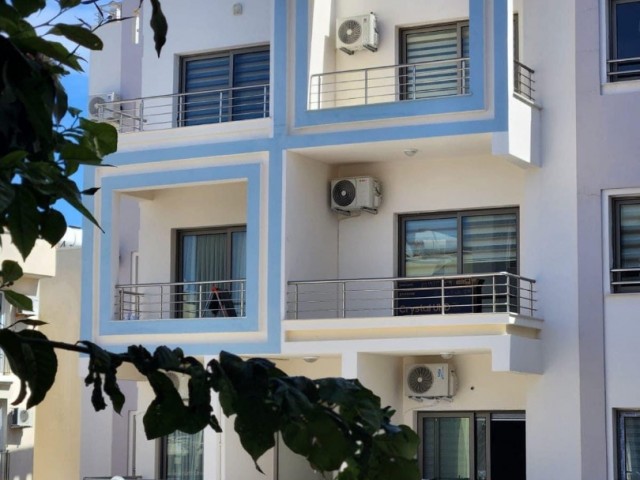 New 2+1 flat for sale in a centrally located site with a shared pool in Alsancak