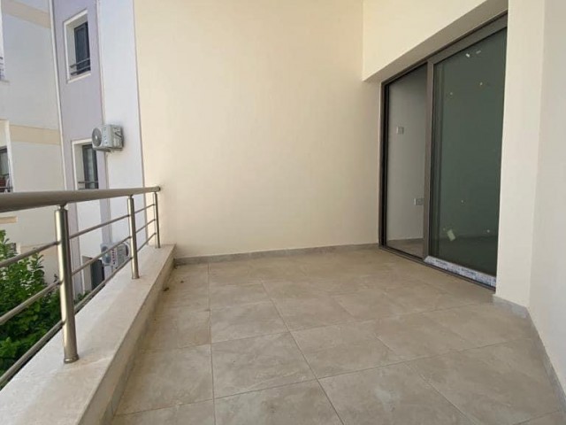 New 2+1 flat for sale in a centrally located site with a shared pool in Alsancak