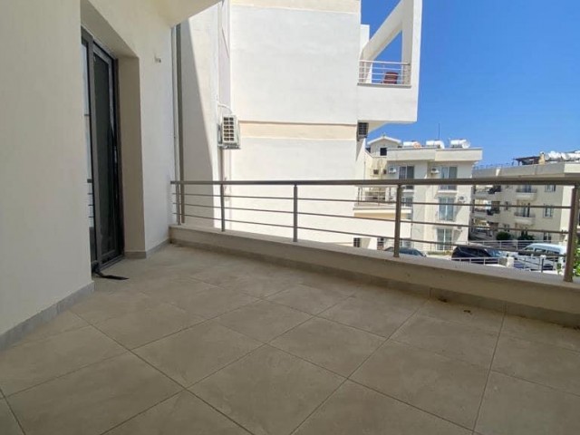 New 2+1 flat for sale in a centrally located site with a shared pool in Alsancak