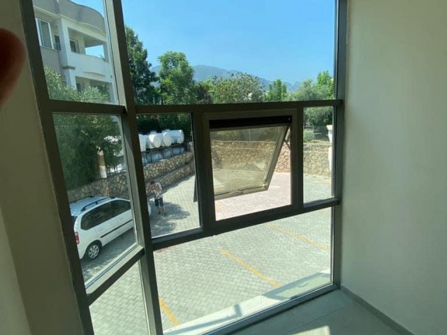 New 2+1 flat for sale in a centrally located site with a shared pool in Alsancak