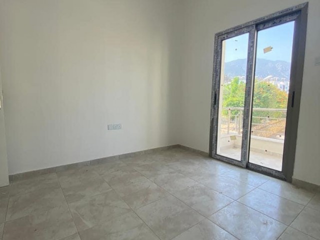 New 2+1 flat for sale in a centrally located site with a shared pool in Alsancak