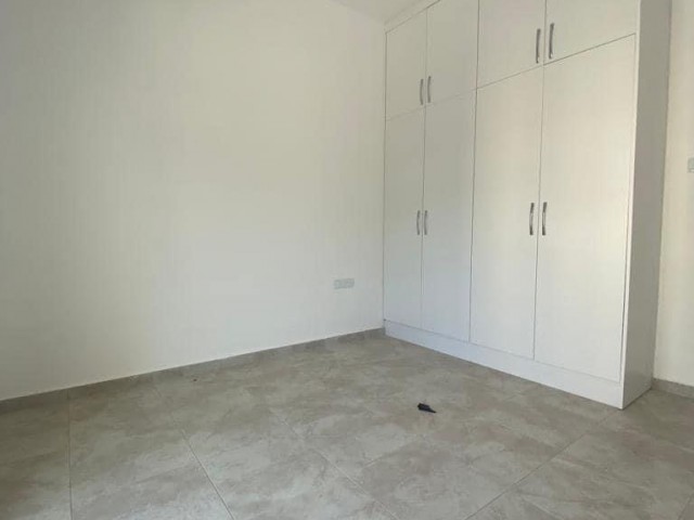 New 2+1 flat for sale in a centrally located site with a shared pool in Alsancak