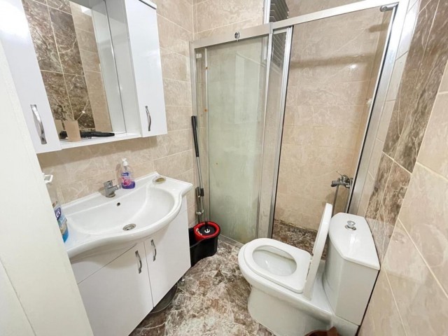 3+1 furnished flat for sale with Turkish title in a building with elevator in the center of Kyrenia