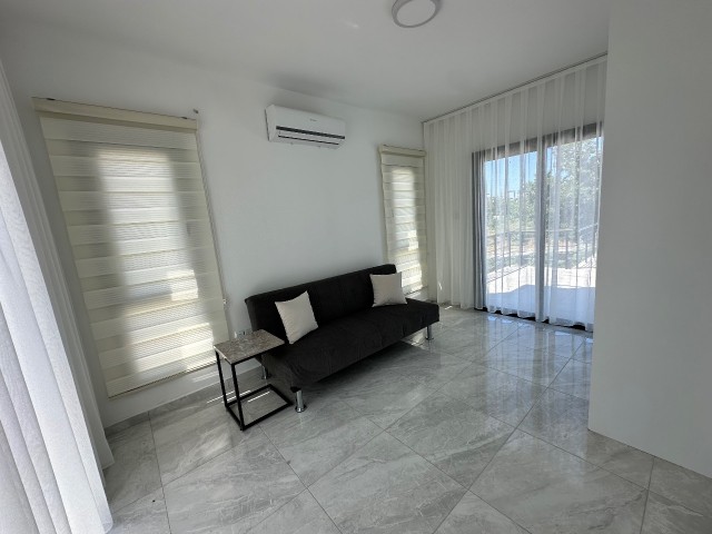 3+1 brand new villa with pool, 3 bathrooms, for sale in Karşıyaka, close to the main road, on the sea side (unfurnished).