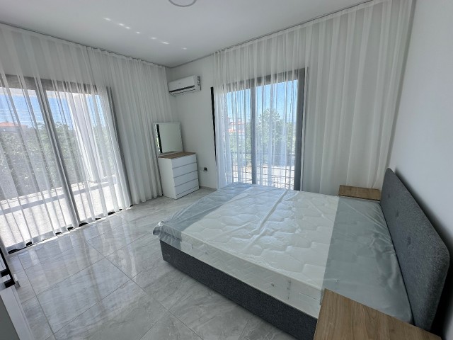 3+1 brand new villa with pool, 3 bathrooms, for sale in Karşıyaka, close to the main road, on the sea side (unfurnished).