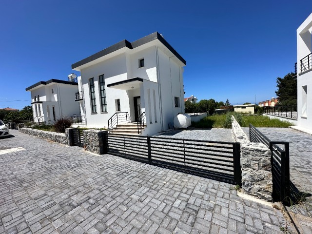 3+1 brand new villa with pool, 3 bathrooms, for sale in Karşıyaka, close to the main road, on the sea side (unfurnished).