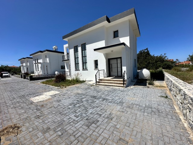 3+1 brand new villa with pool, 3 bathrooms, for sale in Karşıyaka, close to the main road, on the sea side (unfurnished).