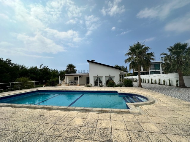 Semi-furnished 3-bedroom, 3-bathroom rental villa with shared pool, centrally located in Alsancak, with 2 villas in use