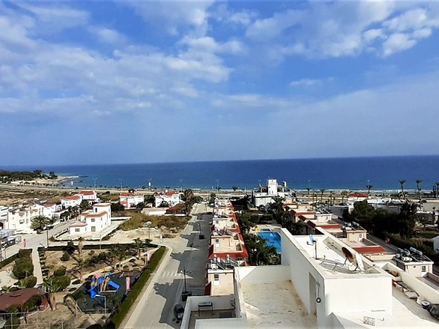 Sea View 1+1 Flat For Sale In Iskele Longbeach