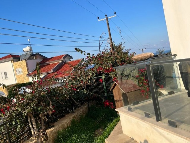 Sea View Apartment for Sale in Alsancak Area with Sea View 2+1 Garden
