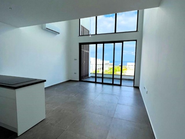 1+1 Loft Penthouse for Sale in Kyrenia Bahçeler, with Eco Health System, 100M from the Sea and Sea View