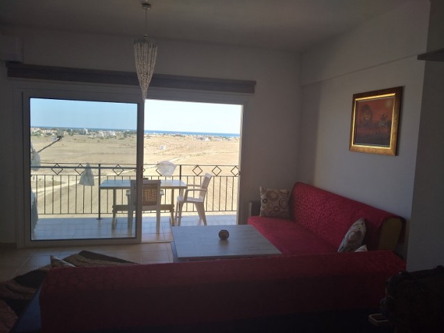 Fully furnished Sea view 1 bedroom apartment, All taxes paid, Ready Title Deeds. 