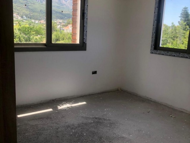 2+1 Flat With A Garden and Mountain View For Sale In Lapta