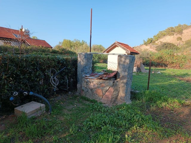 ZU VERKAUFEN IN EINEM KOMPLEX MIT POOL IN KARIYAKA, CA. 1 ACRE LANDFLÄCHE