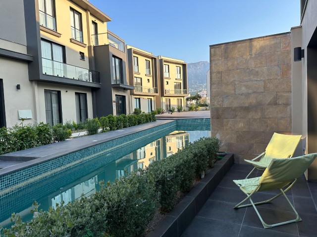 Girne Karaoğlanoğlu 2+1 Flat for Sale in a Site with Shared Pool, Walking Distance to the Sea