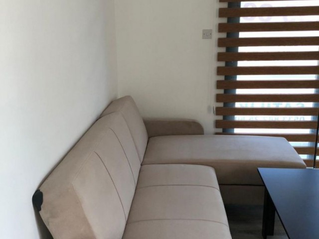 Girne merkezde yeni binada satılık 1+1 ful eşyalı daire.