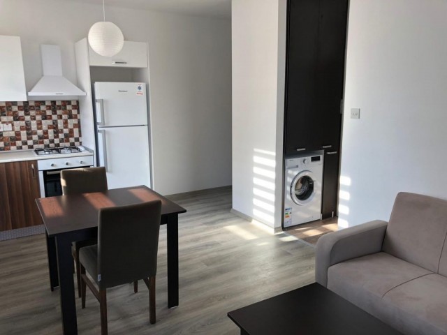 Girne merkezde yeni binada satılık 1+1 ful eşyalı daire.