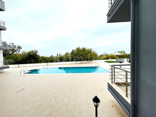 3+1 WOHNUNG MIT POOL ZU VERKAUFEN IN GIRNE ALSANCAK