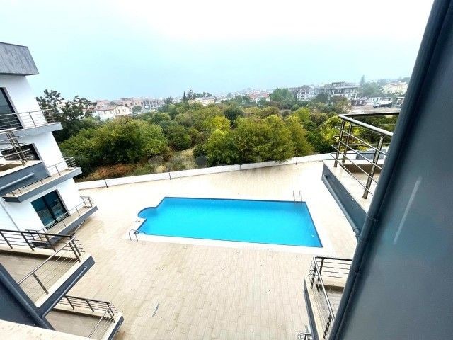 3+1 WOHNUNG MIT POOL ZU VERKAUFEN IN GIRNE ALSANCAK