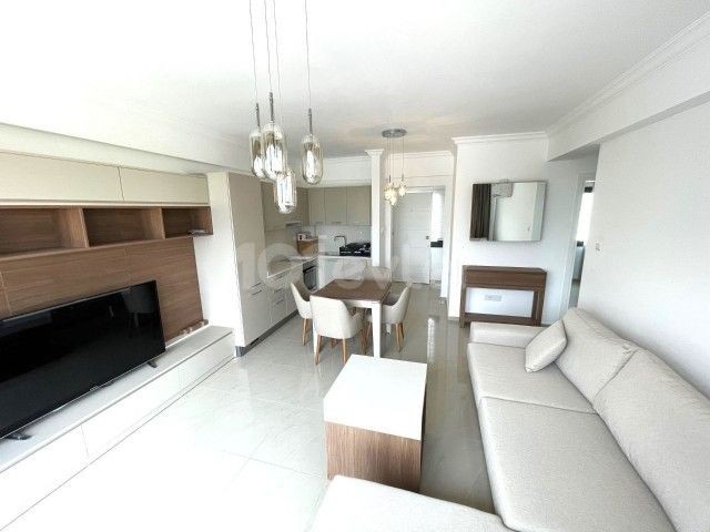 2+1 PENTHOUSE WITH ROOF TERRACE FOR SALE IN A LUXURY SITE WITH POOL IN GIRNE ALSANCAK