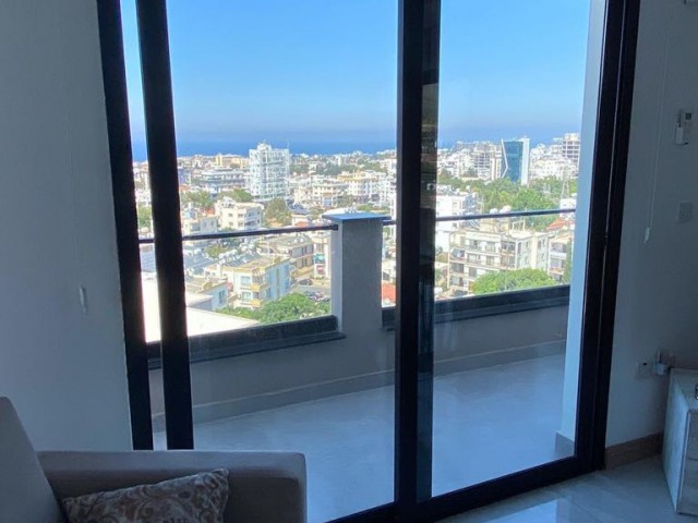 FASCINATING PENTHOUSE WITH MOUNTAIN AND SEA VIEW IN THE HEART OF KYRENIA