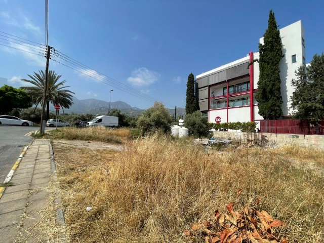 A land plot for sale with a project of a Decommissioned apartment and a shop on the highway as well as sushico in the center of Kyrenia ** 