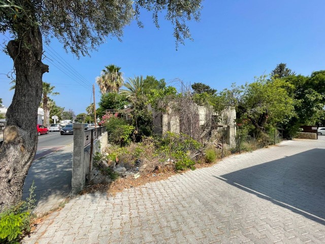 A land plot for sale with a commercial project with a visa on the main road on the Decourse in the center of Kyrenia ** 