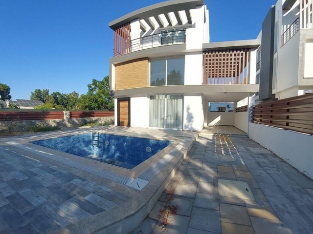 Triplex villa for sale in Karaoglanoglu, Kyrenia with mountain and sea views