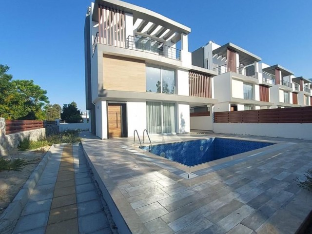 Triplex villa for sale in Karaoglanoglu, Kyrenia with mountain and sea views