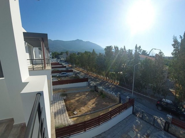 Triplex villa for sale in Karaoglanoglu, Kyrenia with mountain and sea views