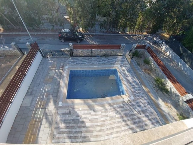 Triplex villa for sale in Karaoglanoglu, Kyrenia with mountain and sea views