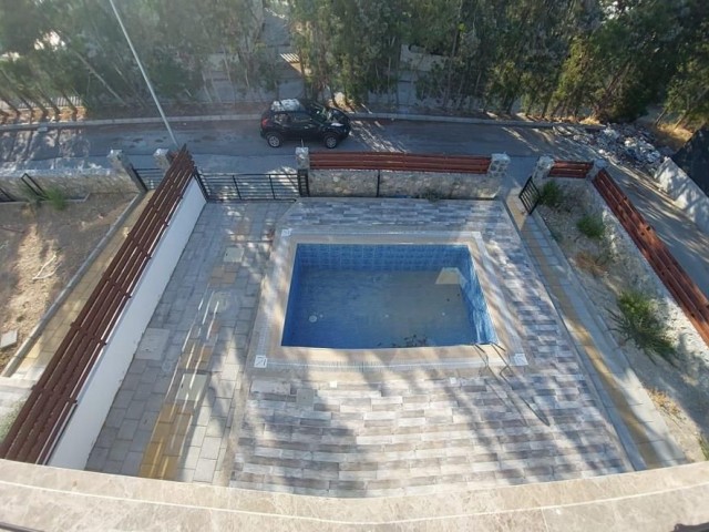 Triplex villa for sale in Karaoglanoglu, Kyrenia with mountain and sea views