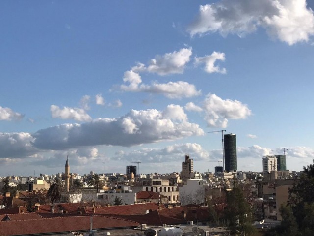 In Front of the Courts within the Central Walls of Nicosia ** 