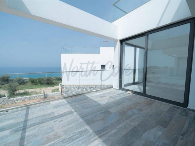 Brand-New 2-Bed Penthouse Serene Beachfront Living