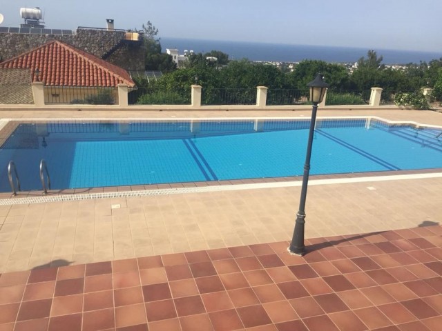 950m2 with magnificent mountain and sea views in Çatalköy. this magnificent villa with 5 bedrooms and a swimming pool in 3.5 acres of land, the view of which is never closed ** 