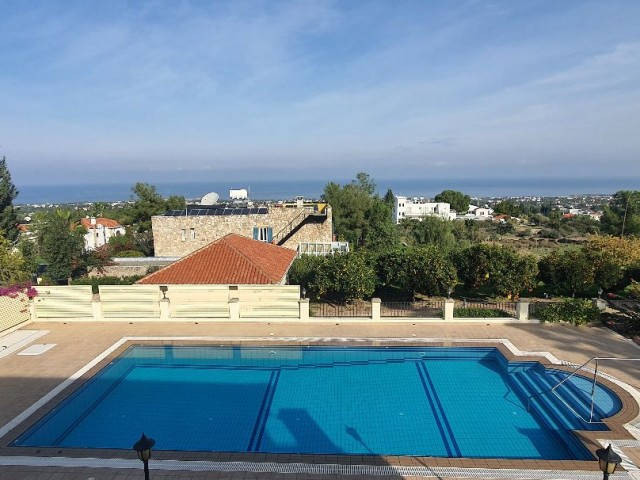 950m2 with magnificent mountain and sea views in Çatalköy. this magnificent villa with 5 bedrooms and a swimming pool in 3.5 acres of land, the view of which is never closed ** 