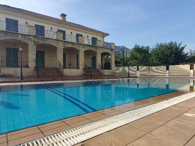 950m2 with magnificent mountain and sea views in Çatalköy. this magnificent villa with 5 bedrooms and a swimming pool in 3.5 acres of land, the view of which is never closed ** 