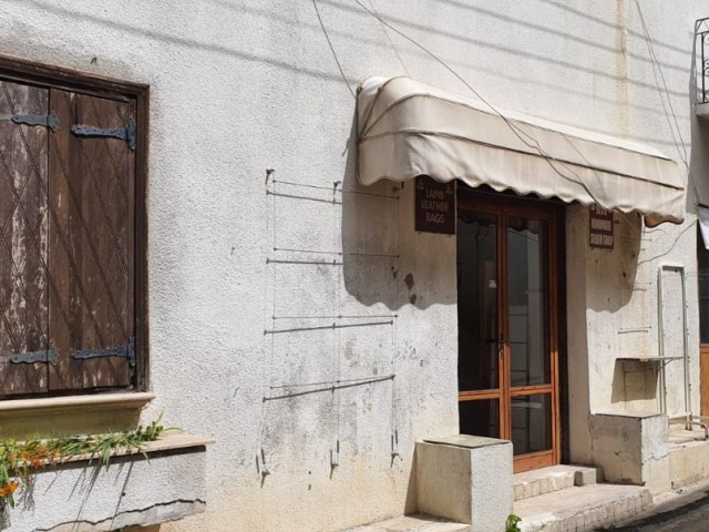 Historical buildings ( 4 houses, 1 shop) and 1 plot of land will be sold decisively in the village center of Bellapais in Kyrenia, TRNC.The equivalent deed. ** 