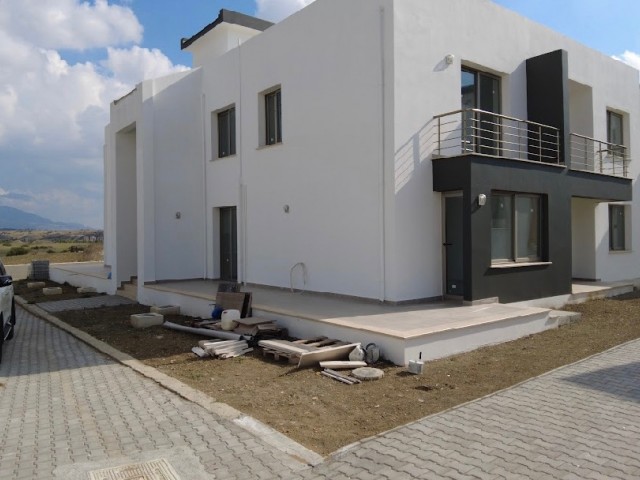 On the Bosphorus in Girne...100 meters from the old Gönyeli Bosphorus road, large flats with garden or terrace are ready..Fully furnished, taxes paid.