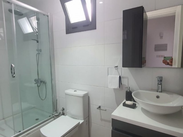 Girne Zeytinlik 3 min to drive center,91 m2 flats with a communal pool .