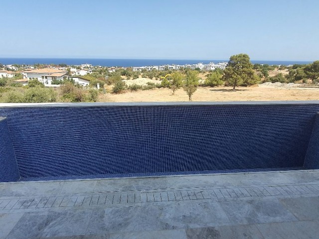 Kyrenia Escape Beach area 4+1 detached villa.Full sea view, pool view...(Equivalent Title Deed)Finished 275,000 STG, they will be finished after 1 year 250,000 STG ** 