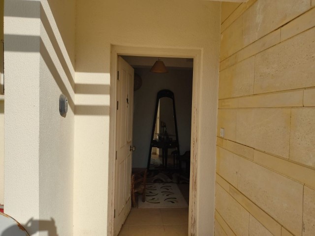 Garden floor 3+1 deed ready flat in Girne Esentepe Turtle Bay site. Equivalent title deed. ** 