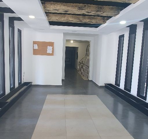 Kyrenia Nusmar market district is located in the prestigious building 1. The apartment has a private indoor garage with a balcony on the floor, a double bathroom with a toilet...Esyal is.(+3000 stg).. .Taxes have been paid. ** 