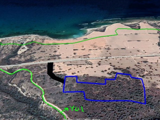 Girne Kaplıca( iskele kazasına bağlı) Deniz manzaralı denize yakın konumda sarı bölge  EŞDEGER Tapulu 21 dönüm arazi.(fiyat dönüm başı 60.000)