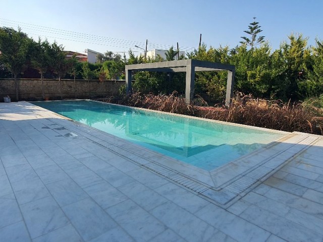 Girne Karakum region with Turkish Land Registry, 1600 m2 garden, 4x11m. Salt system pool, underfloor heating system, Award-winning architect drawing 320m2 closed area, 4 bedrooms a