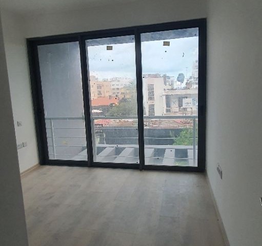 2+1 luxury flat in the center of Kyrenia, Turkish Hearth Club and Barbaroslar market area in a brand new building. VAT unpaid