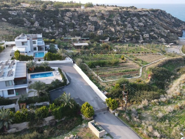 Kyrenia Alagadi, 5+1 Strandpromenade, freistehende, einzigartige Villa mit gleichwertiger Eigentumsurkunde.