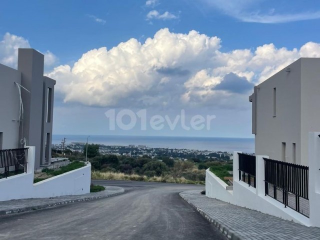 In the mountain slope area of Girne American University, ready for delivery with panoramic mountain and sea views, 4+1 villa with 1000 m2 garden and pool. 