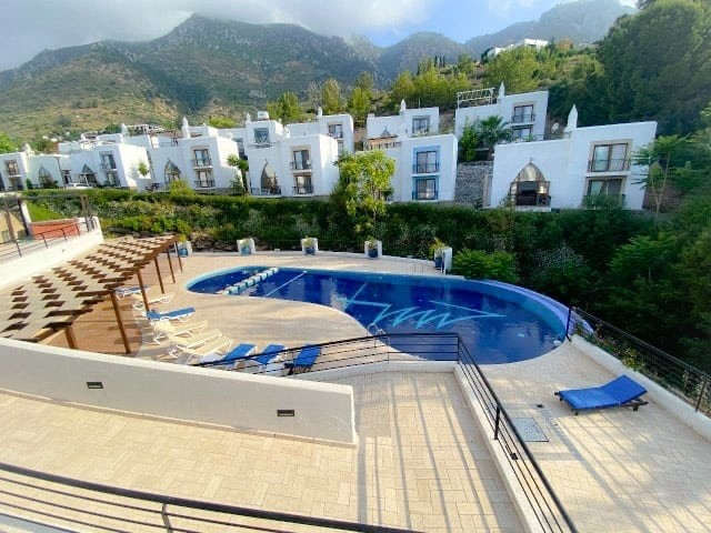 2+1 Villa with Sea View in a Luxury Holiday Site in Karmi, Kyrenia, for Sale with Pool, Sauna and Po